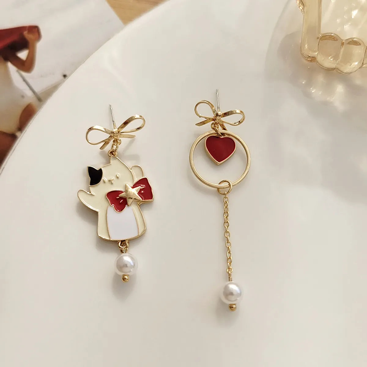 Fashion Heart Shape Cat Bow Knot Alloy Plating Artificial Pearls Women'S Drop Earrings 1 Pair