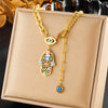 Fashion Highend Retro Doublelayered Goldplated Stainless Steel Palm Eye Pendant Necklace