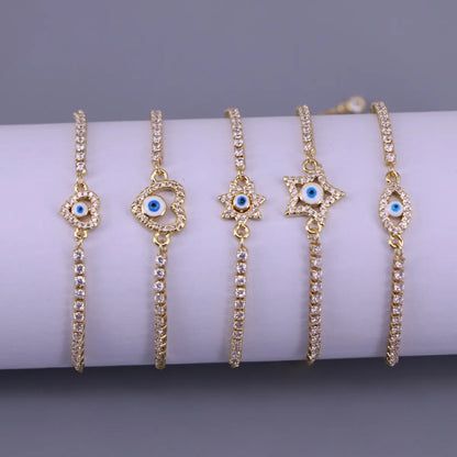 Fashion Hollow Copper Inlaid Zircon Heart Devil's Eyes Geometric Heart Bracelet