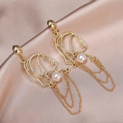 Fashion Human Face Alloy Pearl Hollow Out Women'S Drop Earrings 1 Pair