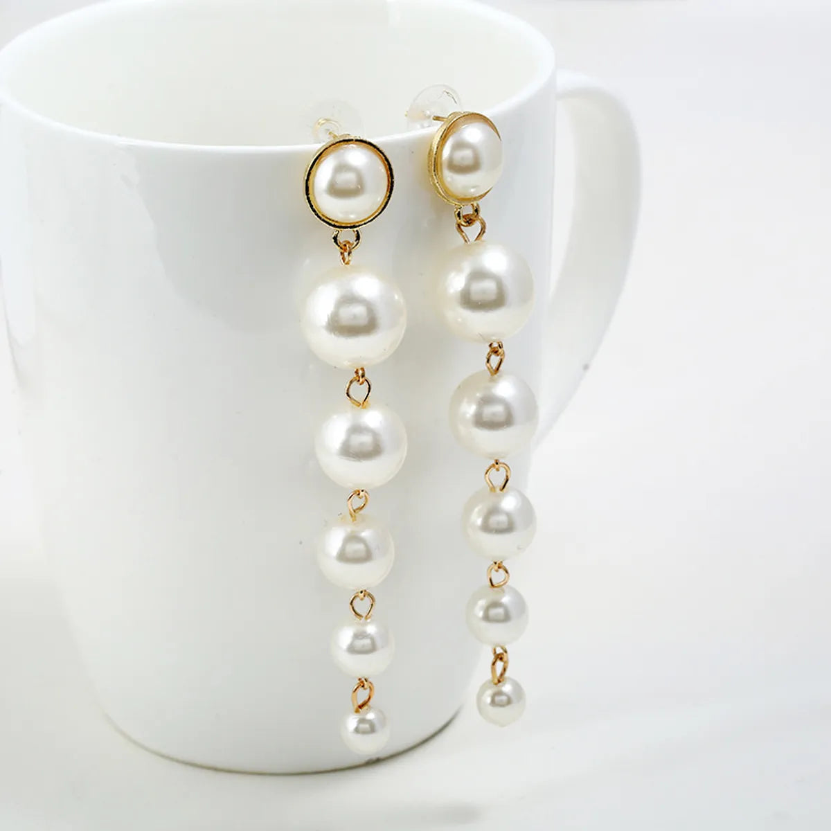 Fashion Long Six-connected Pearl Earrings