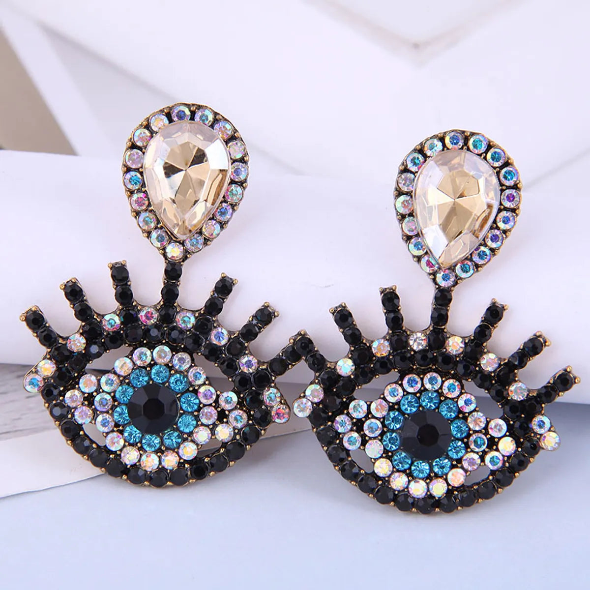 Fashion Metal Flashing Diamond Devil'S Eye Earrings Wholesale Nihaojewelry