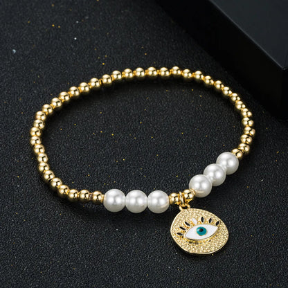 Fashion New Copper Gold-plated Oil Devil's Eye Bracelet Copper Beads Pearl Elastic Bracelet