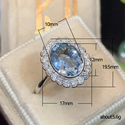 Fashion Niche Copper Inlaid Sea Blue Oval Zircon Flower Ring Wholesale