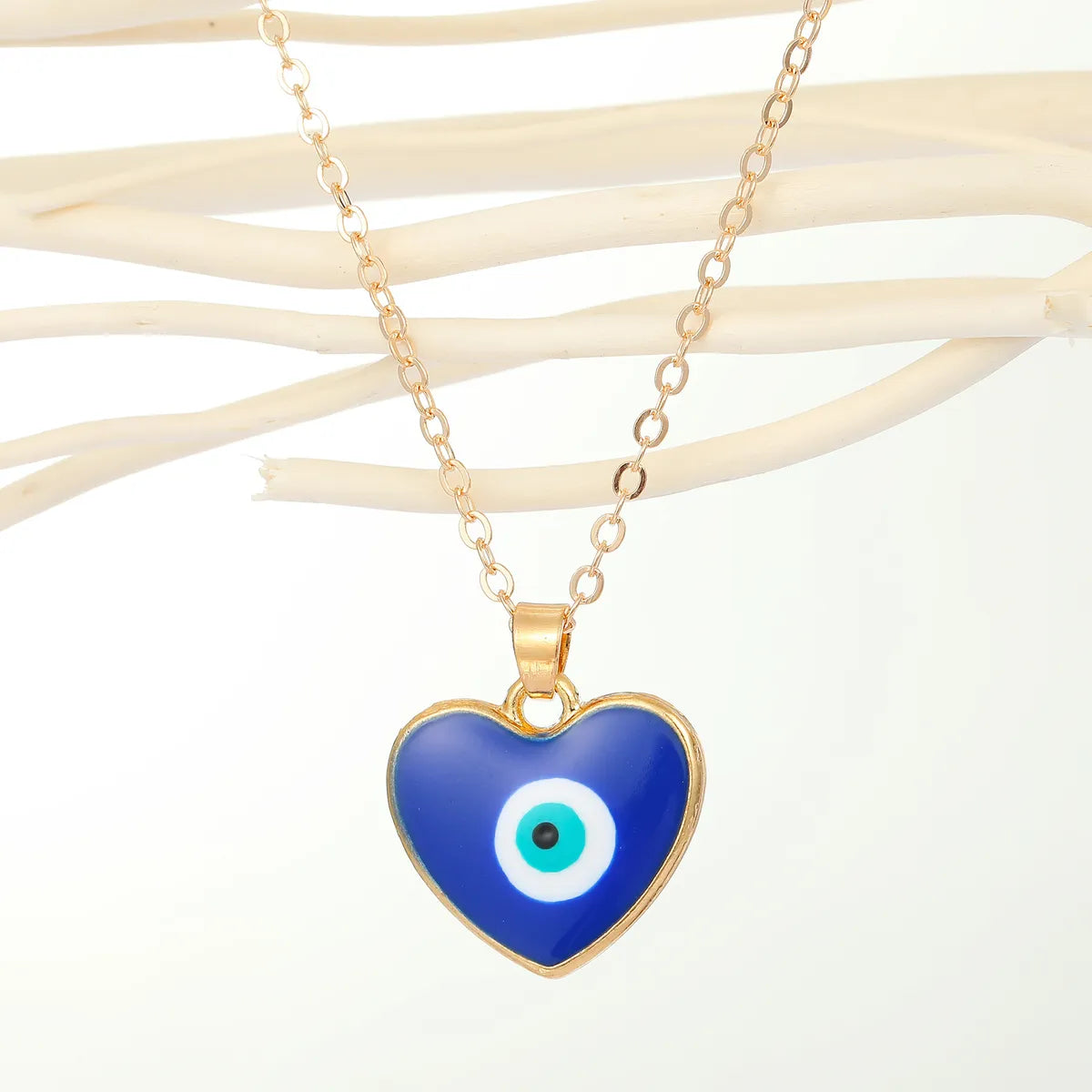 Fashion Peach Heart Round Devil's Eye Pendant Resin Necklace