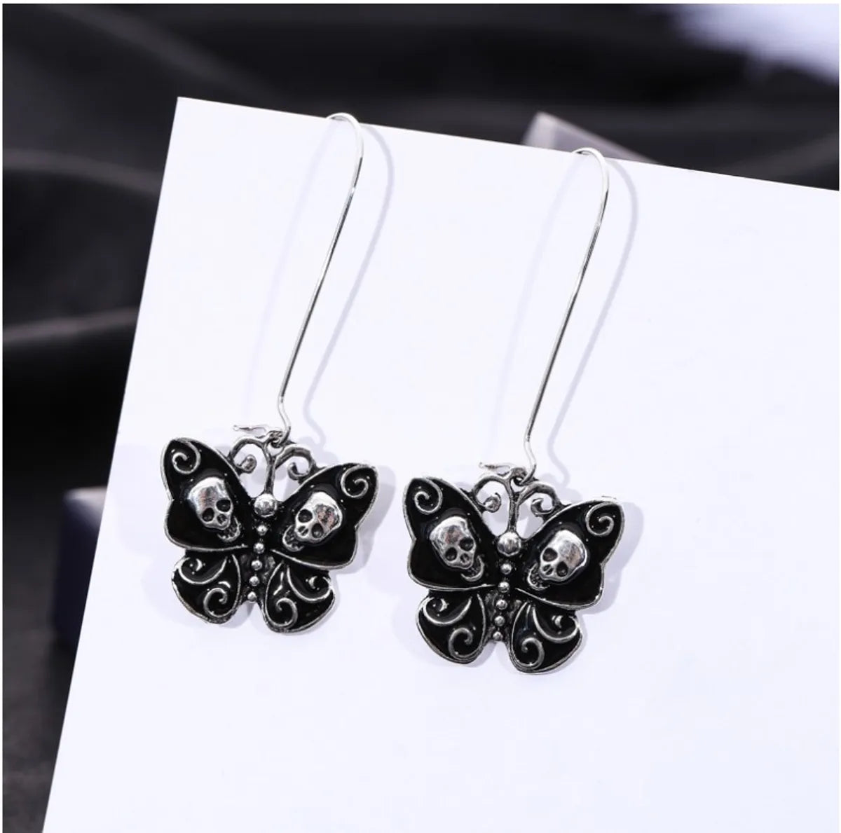 Fashion Simple Oil Dripping Skull Butterfly Earrings Insect Alloy Ear Hook