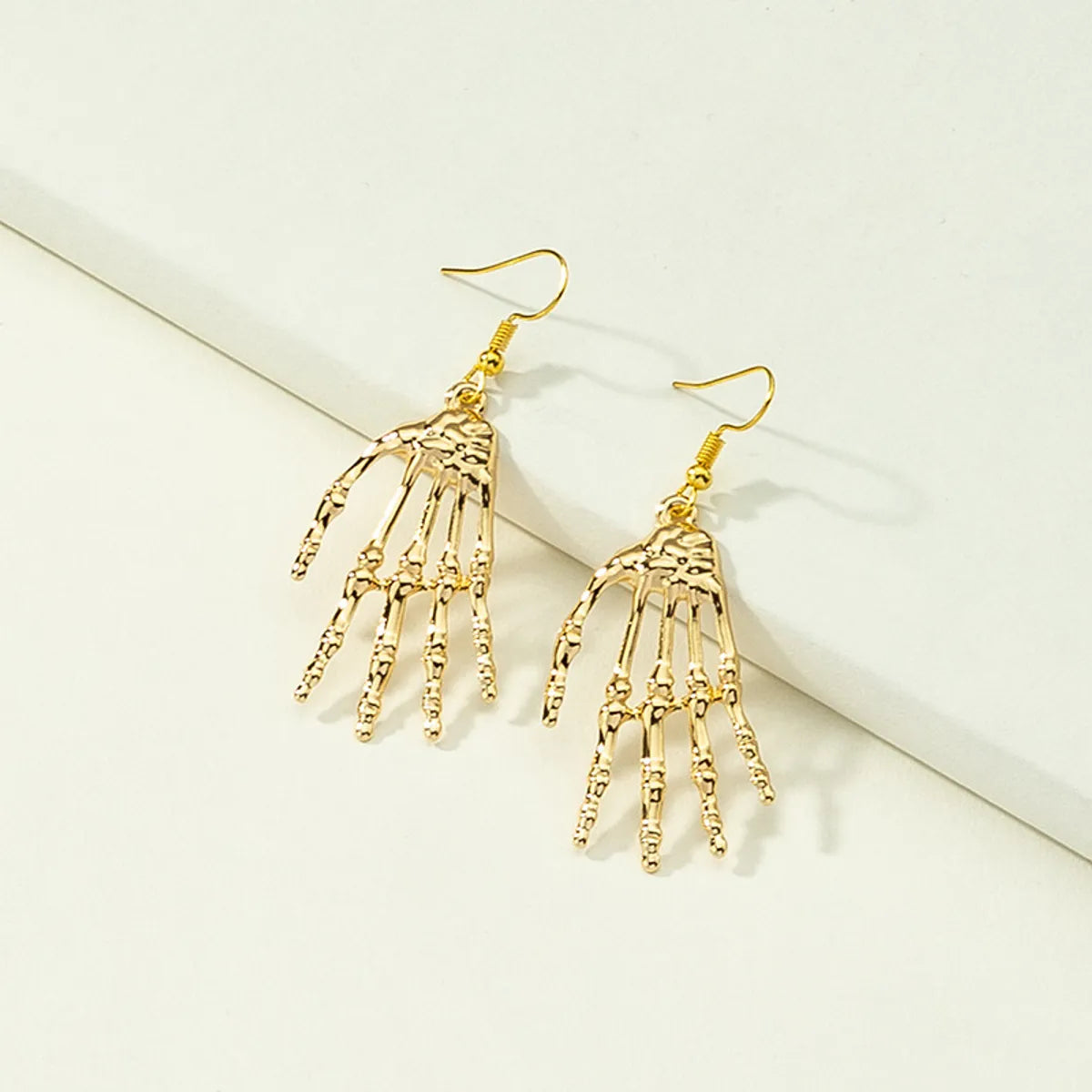 Fashion Skull Palm Alloy Earrings Wholesale