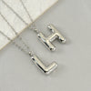 Fashion Stainless Steel And Titanium Steel Chubby Bubble Letter Necklace With Polishing Treatment And Cross Chain