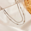 Fashion Stainless Steel And Titanium Steel Round Bead Necklace And Bracelet With Love Water Drops Bell Pattern