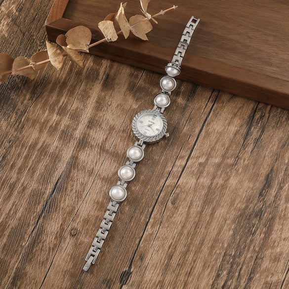 Fashionable Alloy Case Stainless Steel Strap Oval Dial Women's Pearl Thin Belt Fritillary Quartz Watch With Spiral Crown And Ordinary Glass Mirror