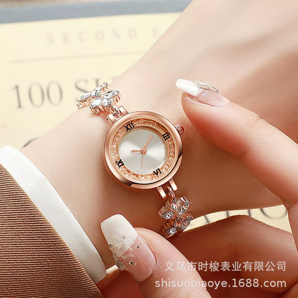 Fashionable Alloy Women's Bracelet Watch With Rhinestone Ball Quicksand And Round Dial