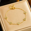 Fashionable Simple Hollow Camellia Stainless Steel Ladies Bracelet With Electroplating Treatment And Niche Design
