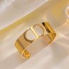 Fashionable Wide Titanium Steel C Shaped Opening Bracelet With Cd Letter Design 18K Gold Plated Polished Vacuum Furnace Electroplated Anti Allergic And Color Preserving