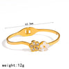 Flowerembellished Diamondstudded 18K Goldplated Stainless Steel Bracelet With Light Luxury Style