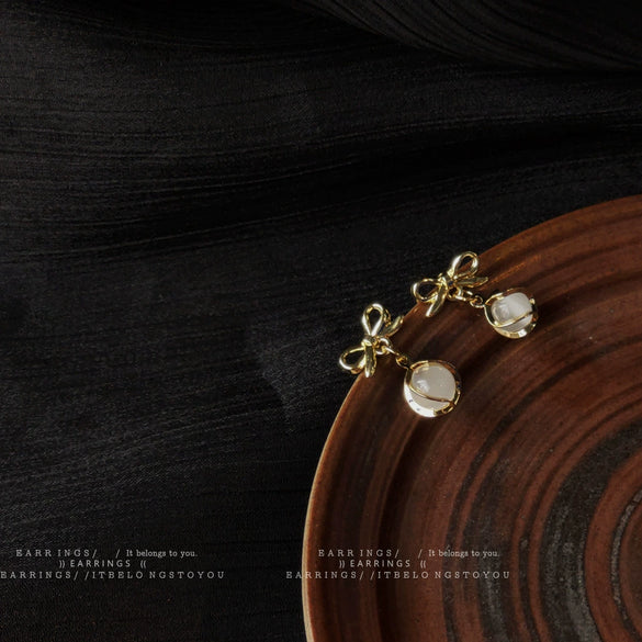 French Retro Bow Cat Eye Stone Earrings For Women Gold Plated Alloy Geometric Earrings With Set Stone Detail
