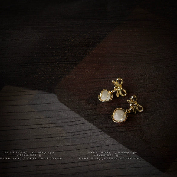 French Retro Bow Cat Eye Stone Earrings For Women Gold Plated Alloy Geometric Earrings With Set Stone Detail