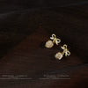 French Retro Bow Cat Eye Stone Earrings For Women Gold Plated Alloy Geometric Earrings With Set Stone Detail