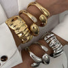 Geometric Irregular Exaggerated Metal Bracelet For Women With Electroplating And Liquid Metal Glow Surface And Water Drops Design