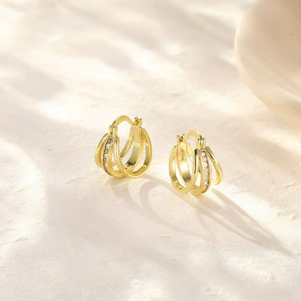 Geometrically Irregular Twisted C Shaped Unisex Earrings In Copper With Zirconia Design