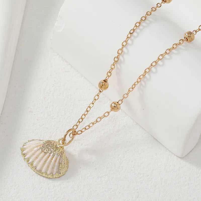 Glam Lady Beach Shell Alloy Gold Plated Women'S Pendant Necklace