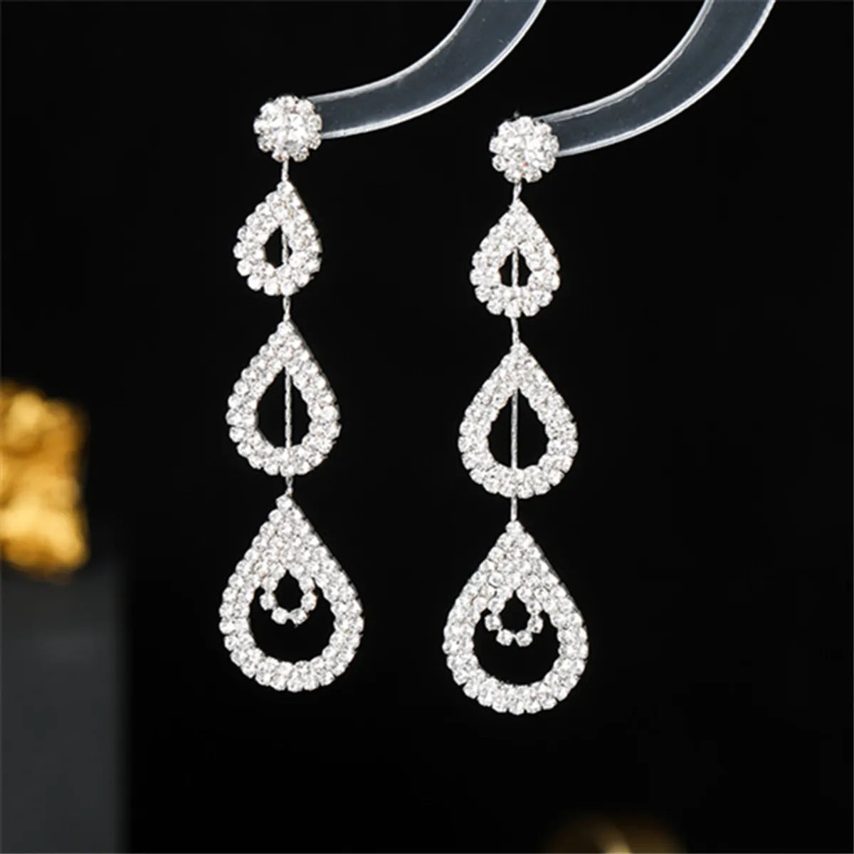 Glam Shiny Water Droplets Rhinestone Plating Hollow Out Inlay Rhinestones Silver Plated Women'S Drop Earrings