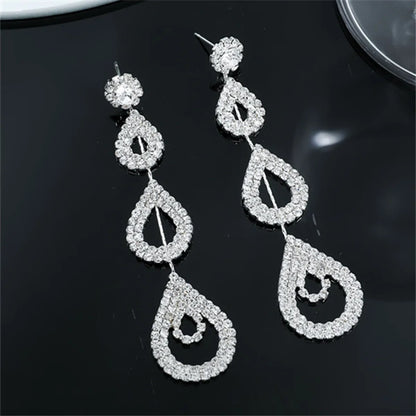 Glam Shiny Water Droplets Rhinestone Plating Hollow Out Inlay Rhinestones Silver Plated Women'S Drop Earrings