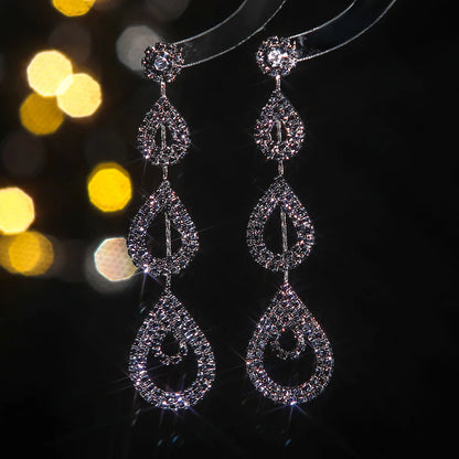 Glam Shiny Water Droplets Rhinestone Plating Hollow Out Inlay Rhinestones Silver Plated Women'S Drop Earrings