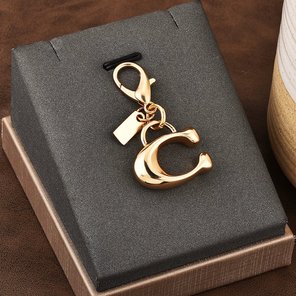 Gold Electroplated Car Key Pendant With Bear Cherry Fourleaf Clover And Butterfly Patterns For Schoolbag Jewelry Wholesale