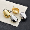 Gold Plated Copper Geometric Oval Sphere Statement Earrings With Glossy Polished Eggshell Design For Women