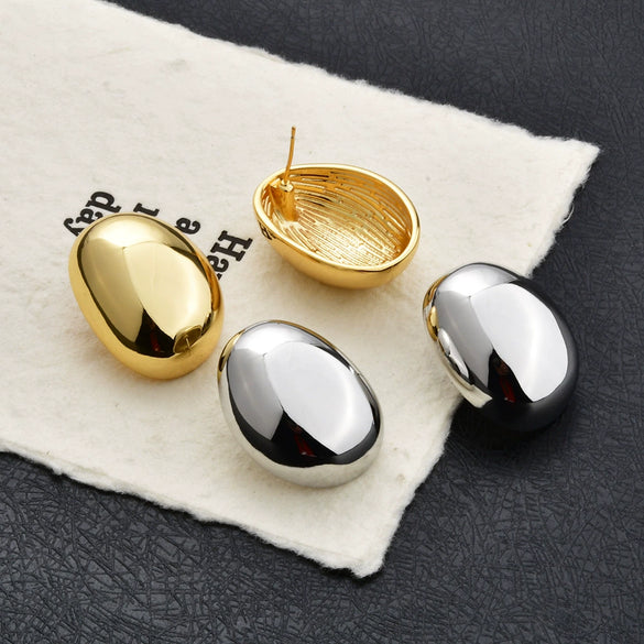 Gold Plated Copper Geometric Oval Sphere Statement Earrings With Glossy Polished Eggshell Design For Women