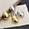 Gold Plated Copper Geometric Oval Sphere Statement Earrings With Glossy Polished Eggshell Design For Women