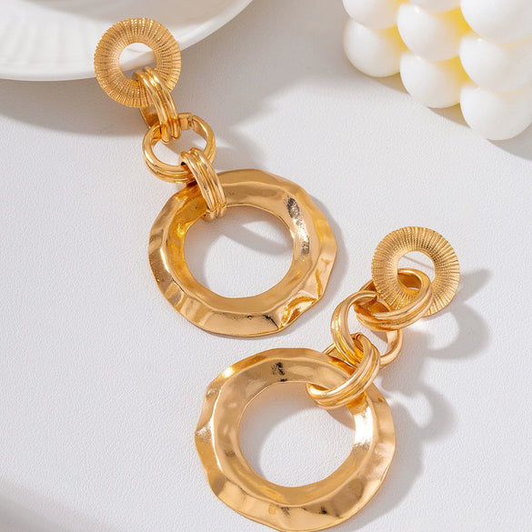 Gold Plated Floral Geometric Interlocking Hoop Earrings With Pleated Brushed Metal Texture And Stainless Steel Posts