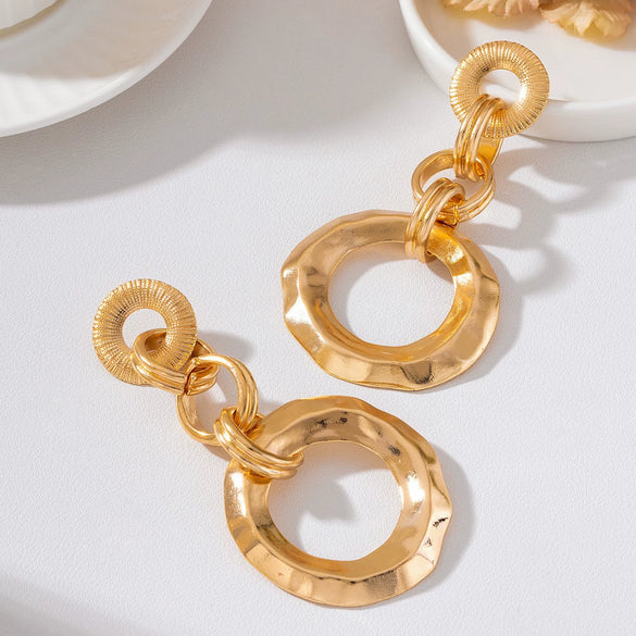 Gold Plated Floral Geometric Interlocking Hoop Earrings With Pleated Brushed Metal Texture And Stainless Steel Posts