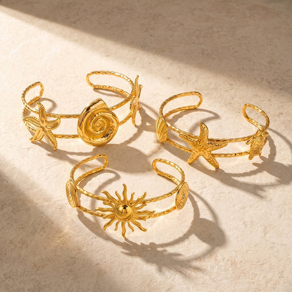 Gold Plated Stainless Steel Bracelet For Women Featuring Starfish Conch And Sun Motifs