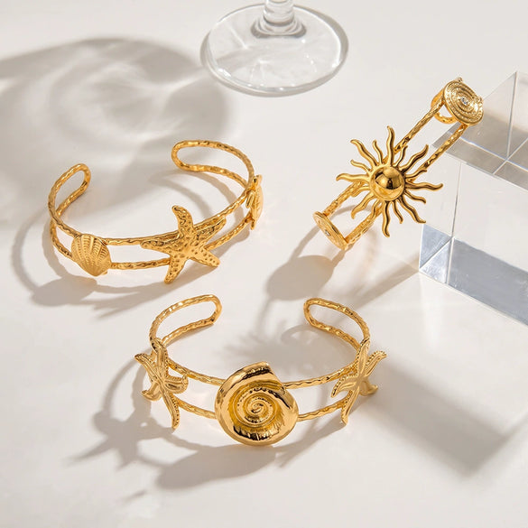 Gold Plated Stainless Steel Bracelet For Women Featuring Starfish Conch And Sun Motifs
