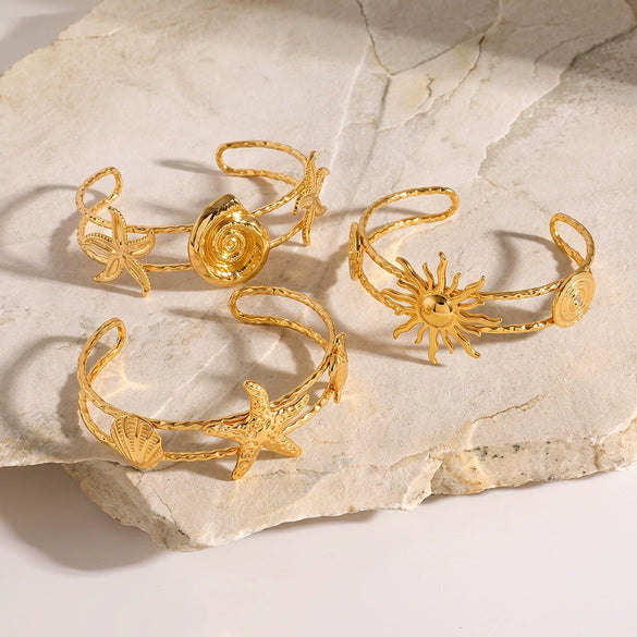 Gold Plated Stainless Steel Bracelet For Women Featuring Starfish Conch And Sun Motifs
