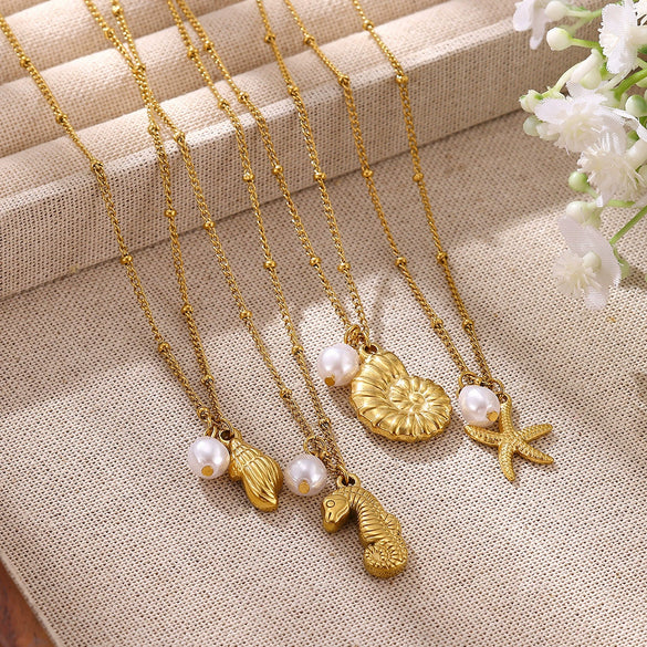 Gold Tone Stainless Steel Ocean Animal Pendant Necklace With Seahorse Conch Starfish And Faux Pearl On An Adjustable Olink Chain
