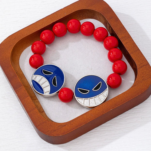 Handmade Alloy Beaded Bracelet With Cartoon Crying Face Pendant Red Beads And Geometric Oil Drip Design For Unisex Wear