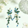 Handmade Copper Leaf Tassel Earrings For Women Sweet Plant Inspired Statement Earrings With Elegant Design