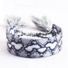 Handwoven Cord Bracelet With Embroidery And Tassel