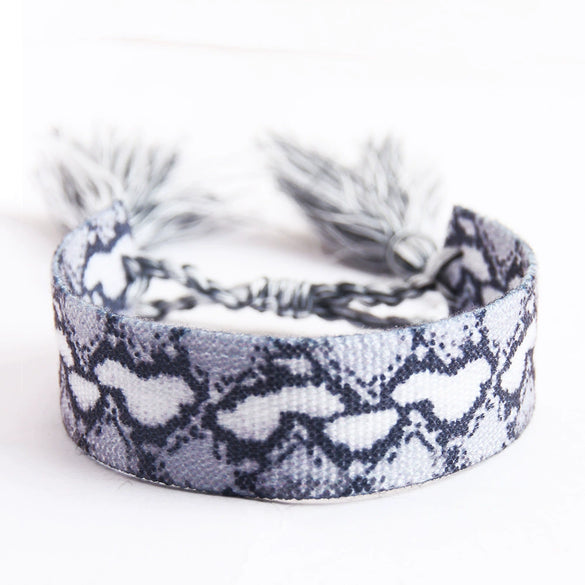Handwoven Cord Bracelet With Embroidery And Tassel