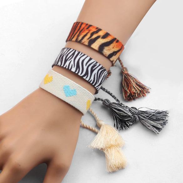 Handwoven Cord Bracelet With Embroidery And Tassel