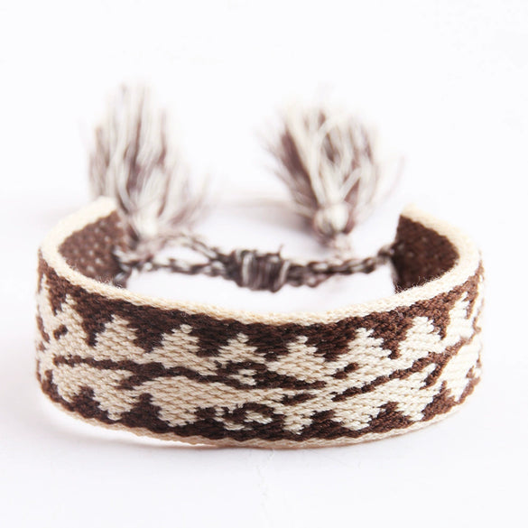 Handwoven Cord Bracelet With Embroidery And Tassel