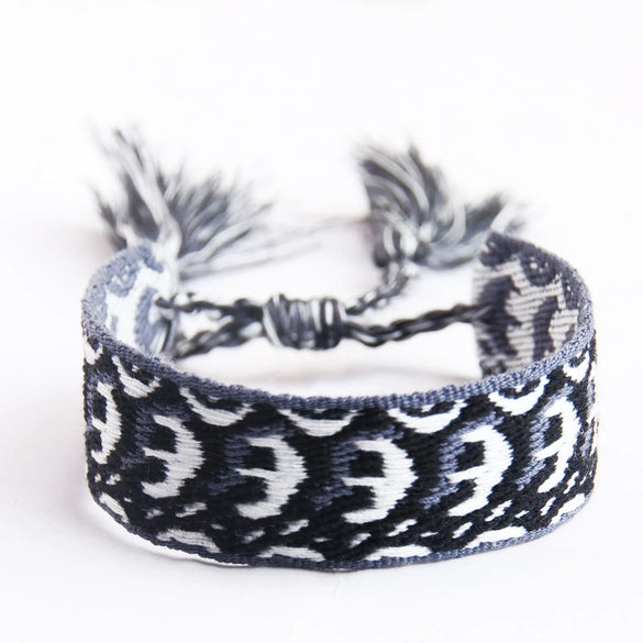 Handwoven Cord Bracelet With Embroidery And Tassel