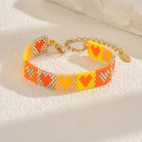 Handwoven Glass And Stainless Steel Heart Bracelet With Colorful Checkered Pattern