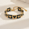 Handwoven Glass And Stainless Steel Heart Bracelet With Colorful Checkered Pattern