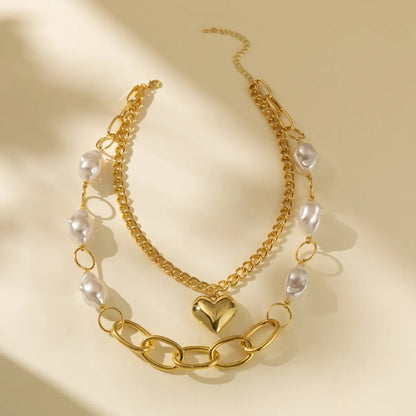 Hip-hop Sweet Heart Shape Imitation Pearl Layered Plating Women's Layered Necklaces