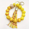 IG Style Casual Sports Tassel Ball Pu Leather Wooden Beads Metal Beaded Printing Bag Pendant Keychain