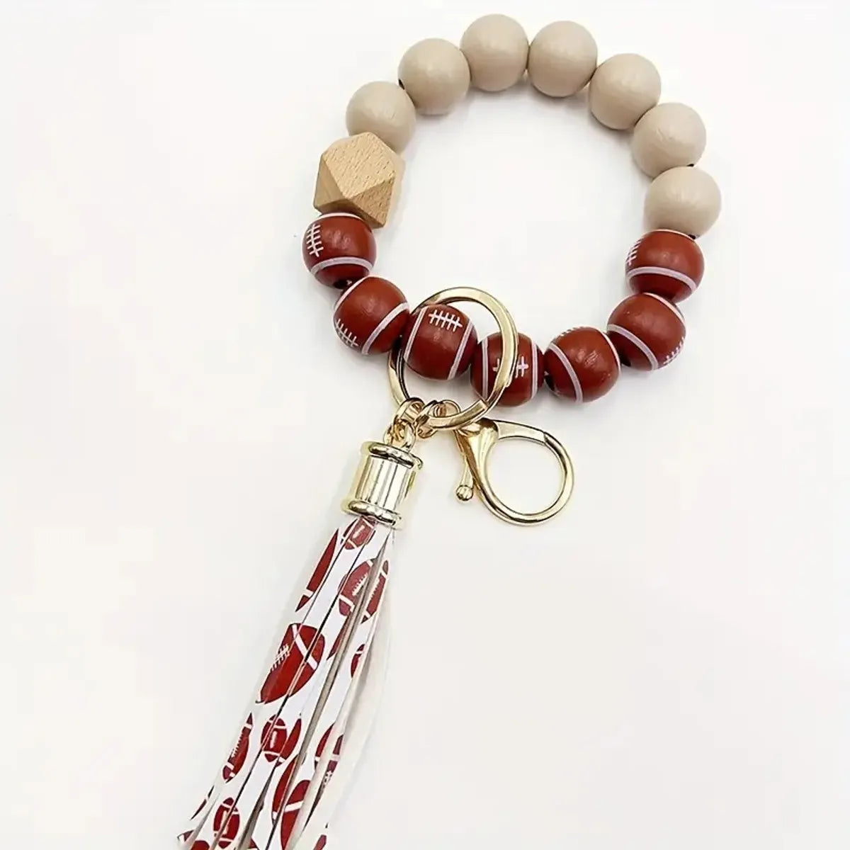 IG Style Casual Sports Tassel Ball Pu Leather Wooden Beads Metal Beaded Printing Bag Pendant Keychain