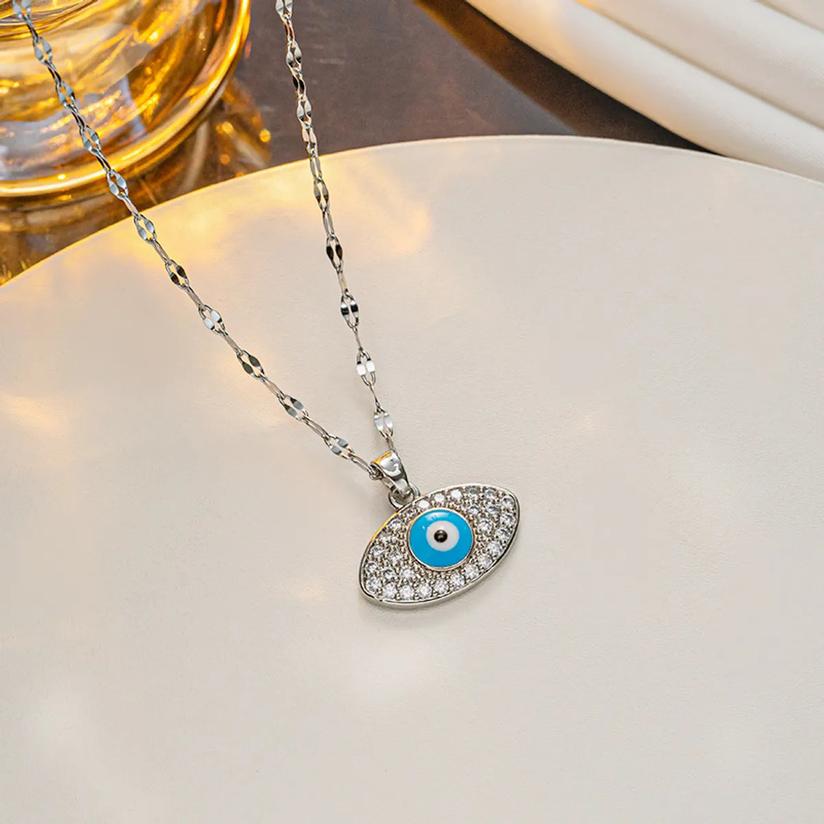 Ig Style Devil'S Eye Titanium Steel Enamel Plating Inlay Artificial Diamond Pendant Necklace